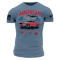 A blue short-sleeve graphic t-shirt featuring a red classic Mustang car, the words 'AMERICAN Legend' in red and white, a palm tree and airplane, and additional graphics on both sleeves.