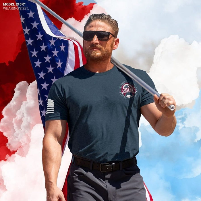 Man holding an American flag with a patriotic background