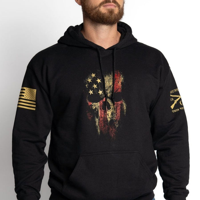 Black hoodie with graphic design on a plain background