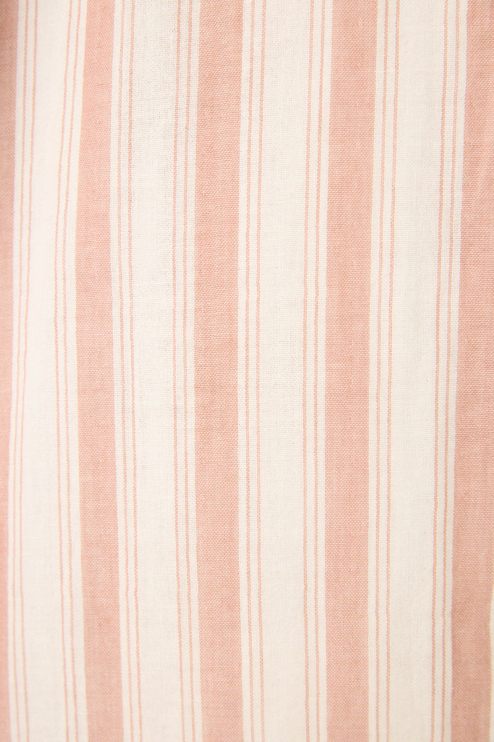 Soft, woven fabric with vertical stripes in light pink and off-white, alternating in thickness for a stylish textured look.