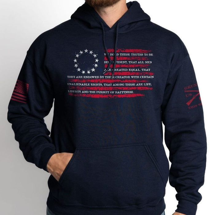 Navy blue hoodie with text and design on a plain background