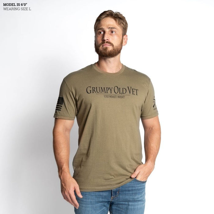 Man wearing a green t-shirt with 'GRUMPY OLD VET' text on a white background