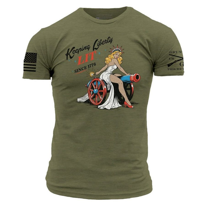 Green t-shirt with graphic design of a woman with a cannon and text on a white background