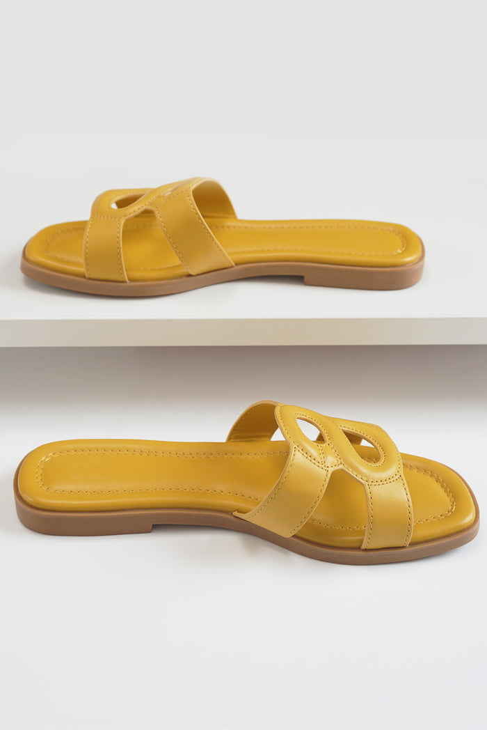 kefi sandal in yellow by buttonscarves side view