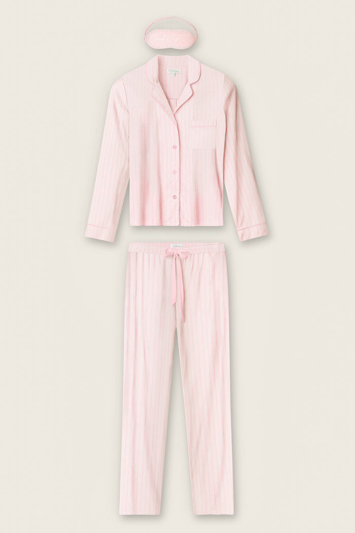 The P.J. Salvage Modal Basics Pink Stripe 3-Piece PJ Set features a light pink striped button-up shirt, drawstring pants, and a matching eye mask, all laid out flat on a plain background.
