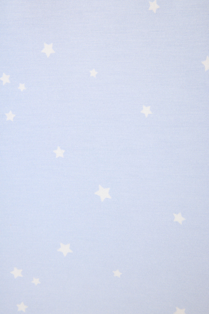 The Modal Basics Star Print 3-Piece PJ Set by P.J. Salvage features a light blue background adorned with small white stars in a simple, evenly spaced pattern.