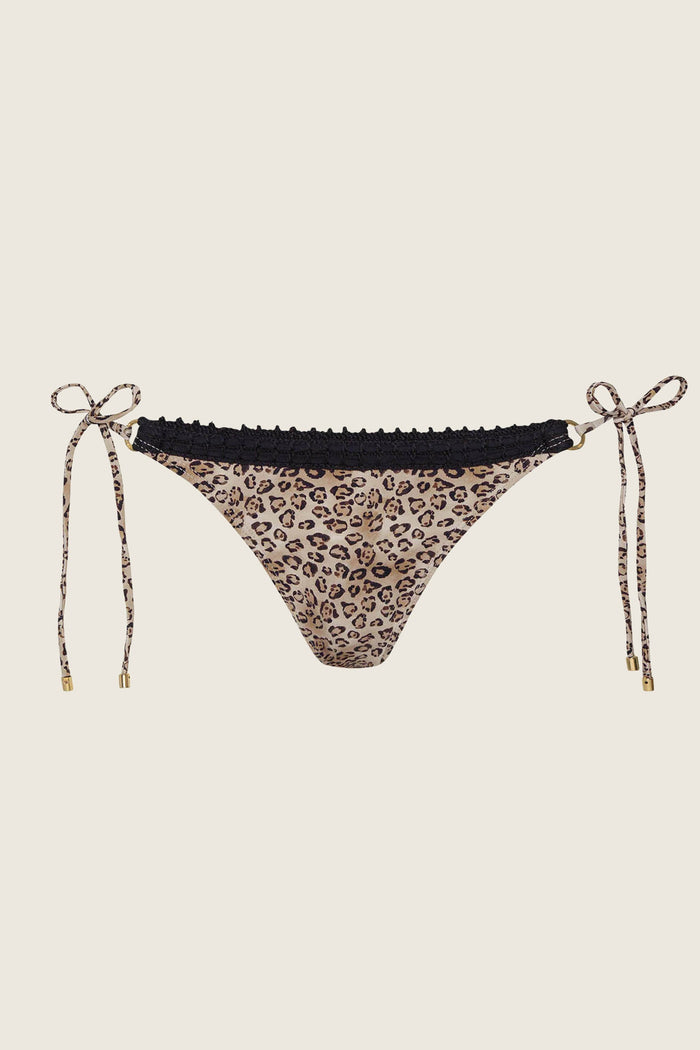 The PQ Swim PJS x PQ Swim Leopard Carrie Crochet Trim Tie Side Bottom features adjustable side ties and ruffled black crochet trim at the waistband, showcased on a plain light background.