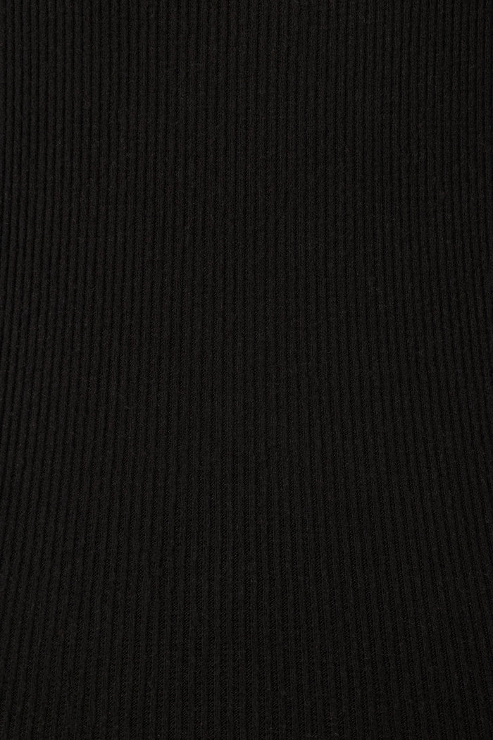 Close-up of the uniform black ribbed fabric featured in P.J. Salvage’s Textured Essentials Black PJ Set, ideal for cozy loungewear with vertical textured lines and an even finish.