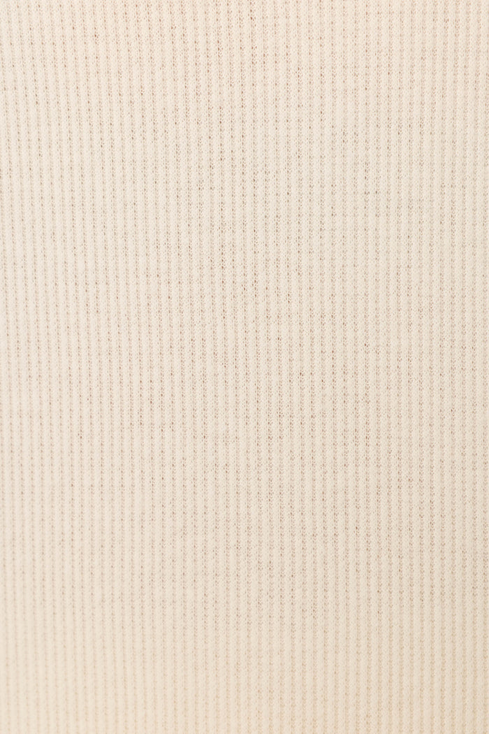 Close-up of the soft, beige rib knit fabric from P.J. Salvage's Textured Essentials Stone Long PJ Set, featuring evenly spaced vertical lines—ideal for cozy loungewear.