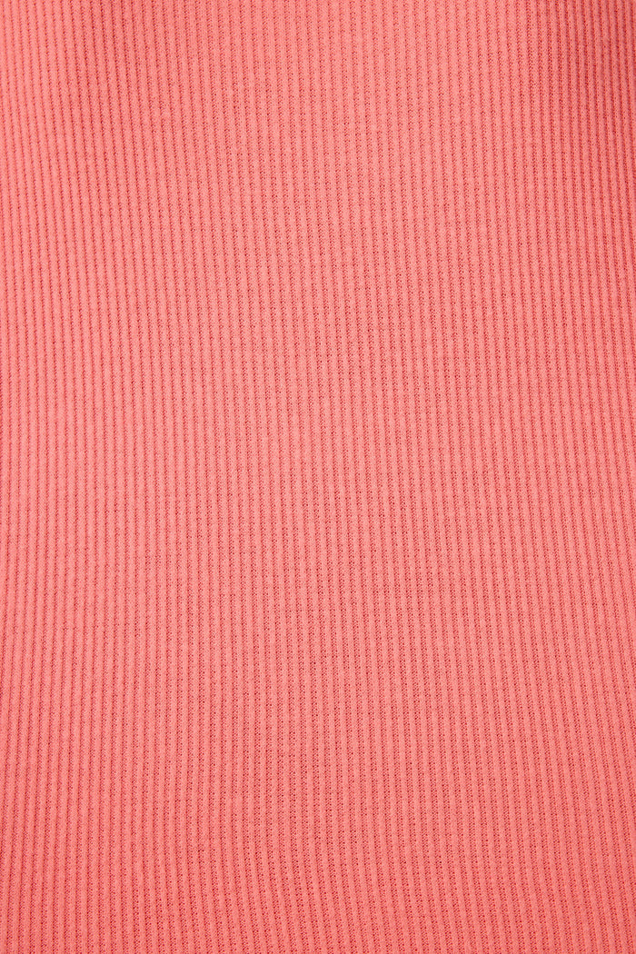 Close-up of the Textured Essentials Sunset Rose Long PJ Set by P.J. Salvage, featuring solid pink rib knit fabric with vertical lines and an even texture.