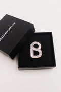 The Lavish Signature Brooch in Gold