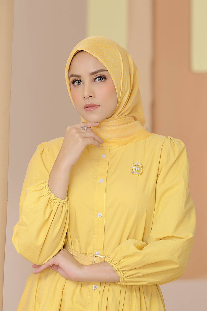 the tapis square scarf in banana cream by buttonscarves front view