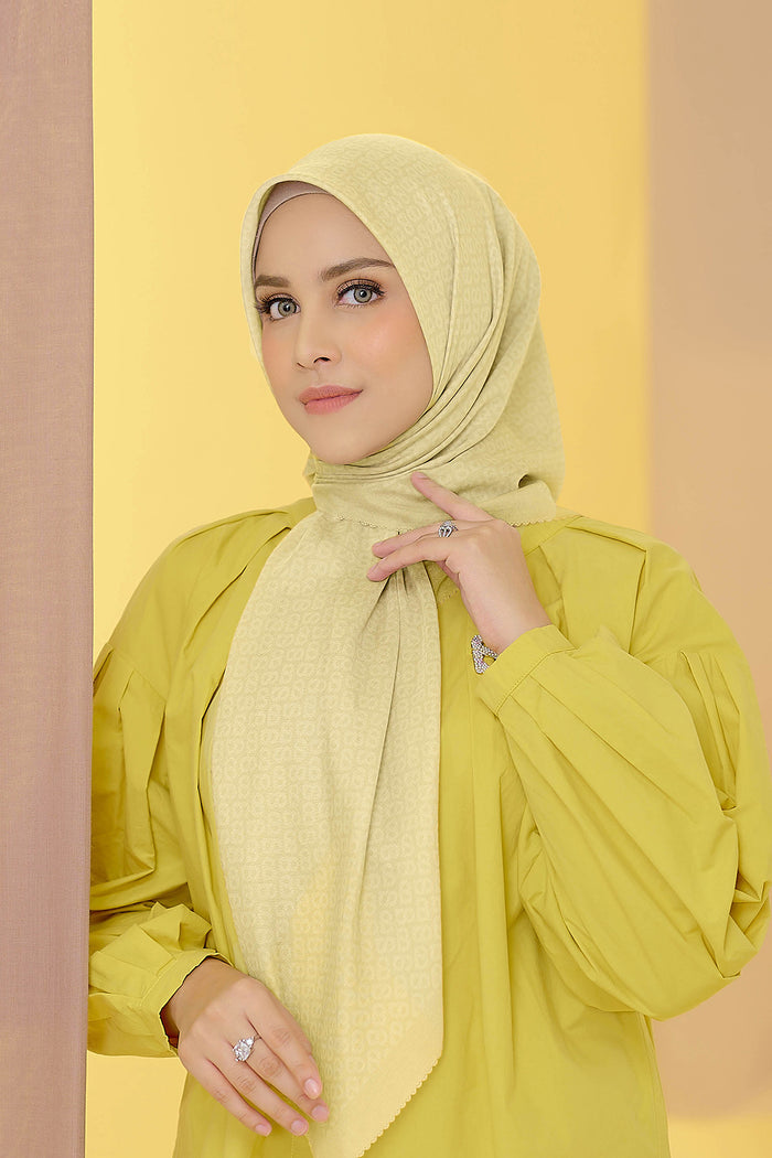 the tapis square scarf in bleached sand by buttonscarves front view