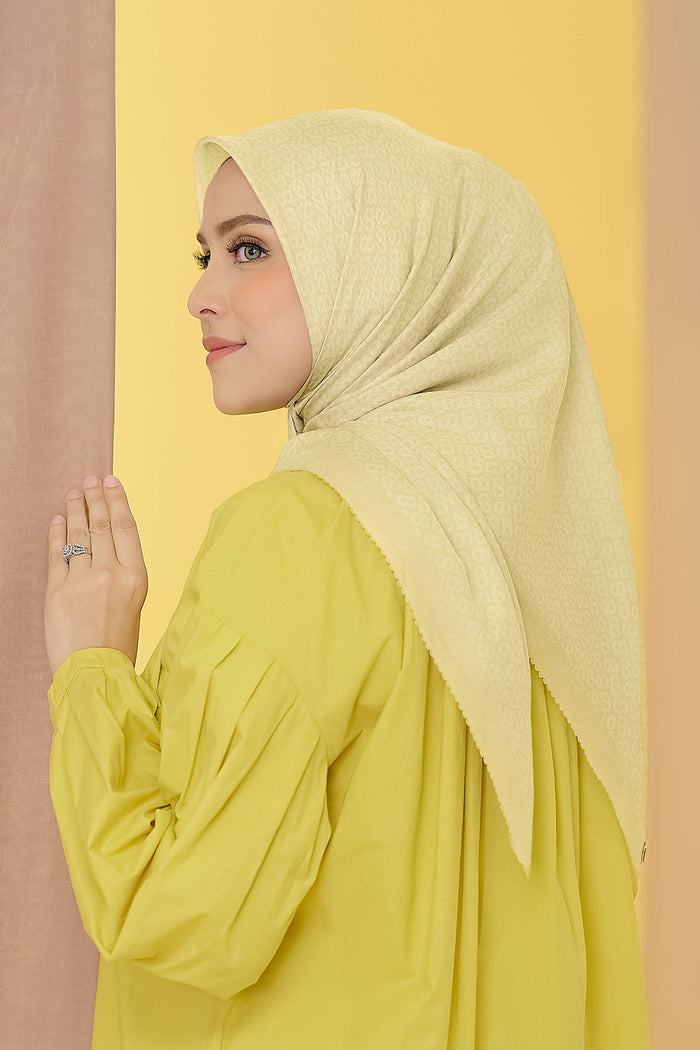 the tapis square scarf in bleached sand by buttonscarves back view