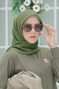 the tapis square scarf in cactus by buttonscarves front view