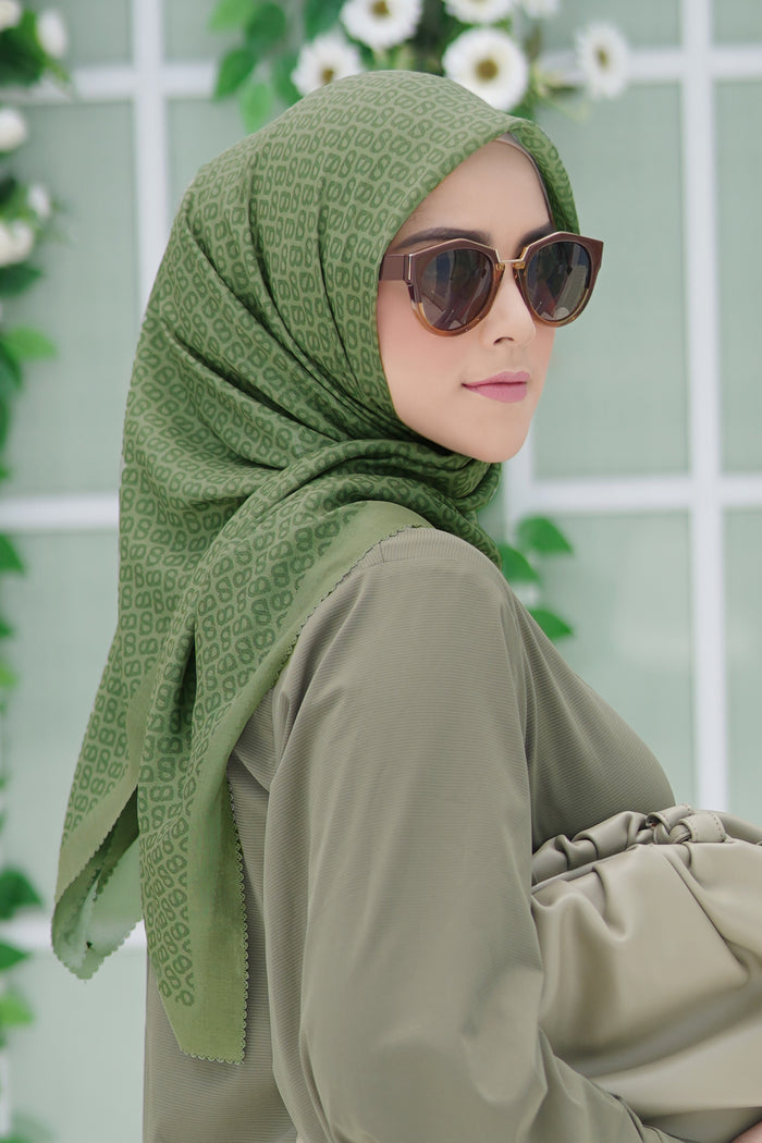 the tapis square scarf in cactus by buttonscarves side view
