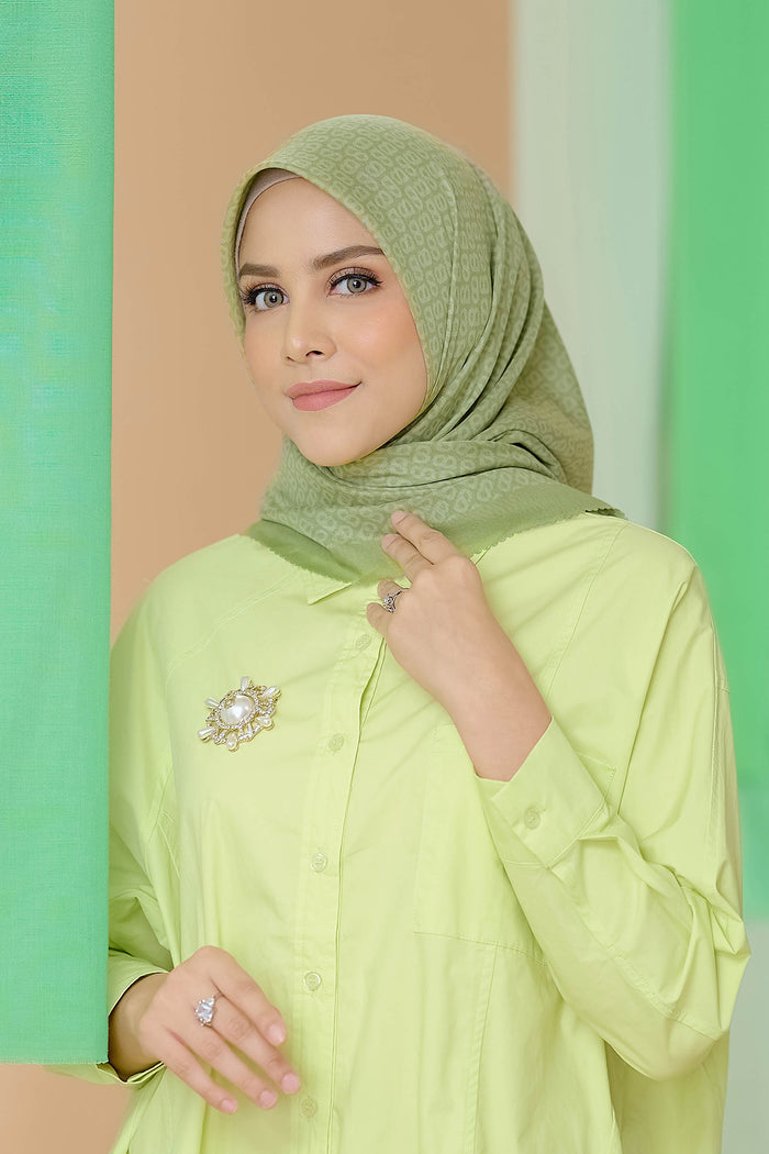 the tapis square scarf in fern by buttonscarves front view