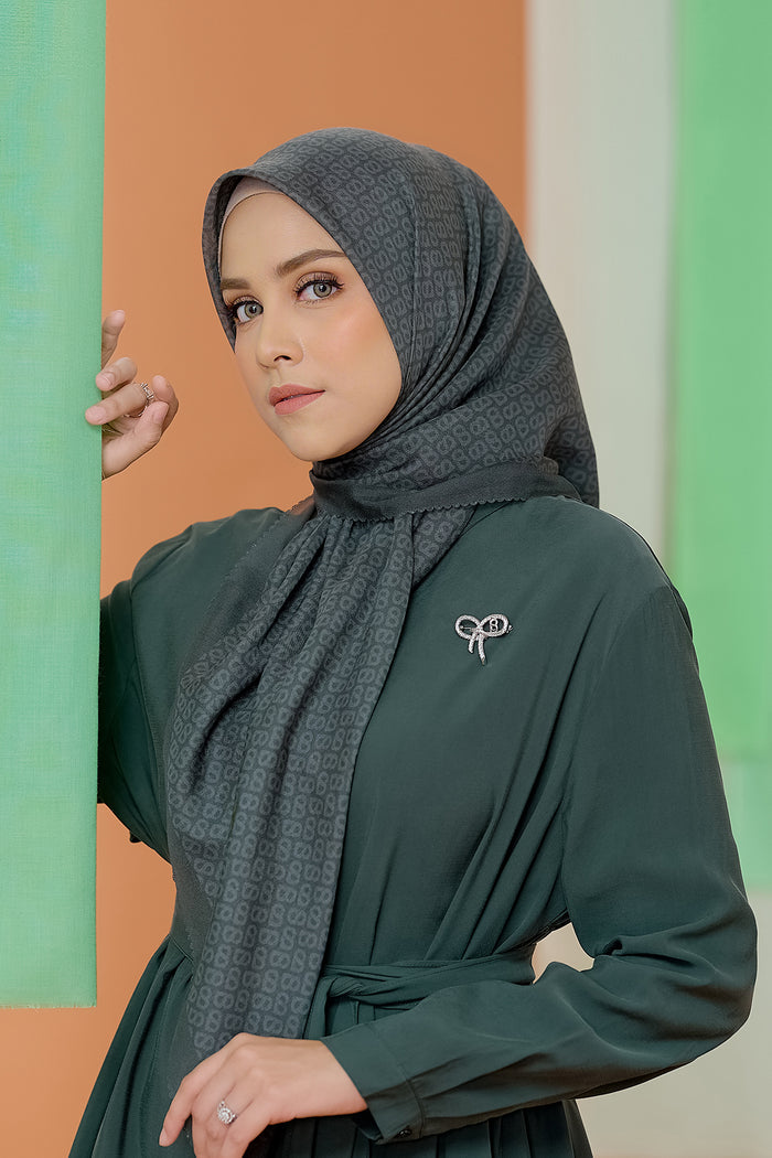 the tapis square scarf in kombu green by buttonscarves front view