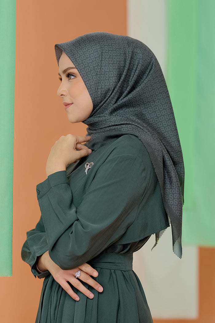 the tapis square scarf in kombu green by buttonscarves side view