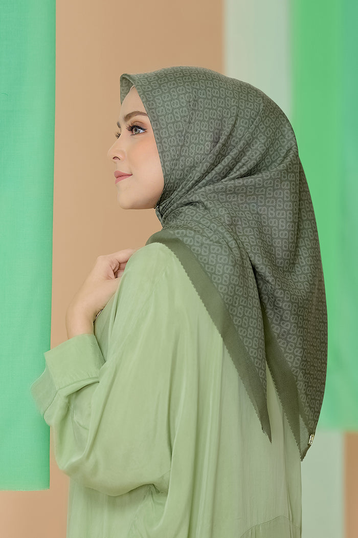 the tapis square scarf in sphagnum by buttonscarves side view