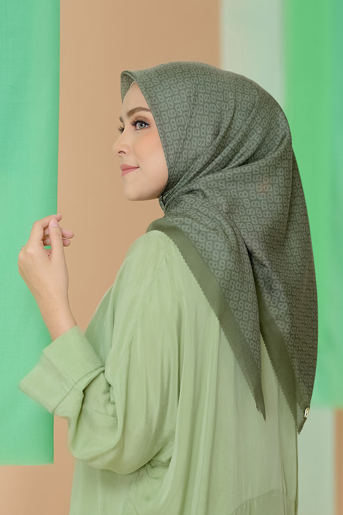 the tapis square scarf in sphagnum by buttonscarves side view