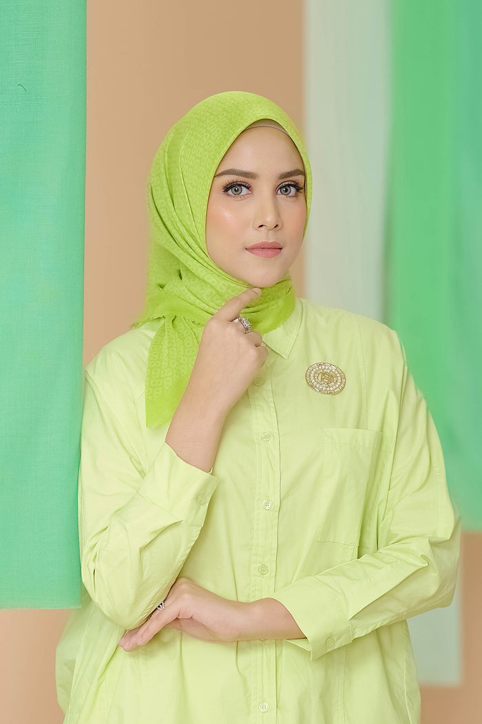 the tapis square scarf in sulphur spring by buttonscarves front view