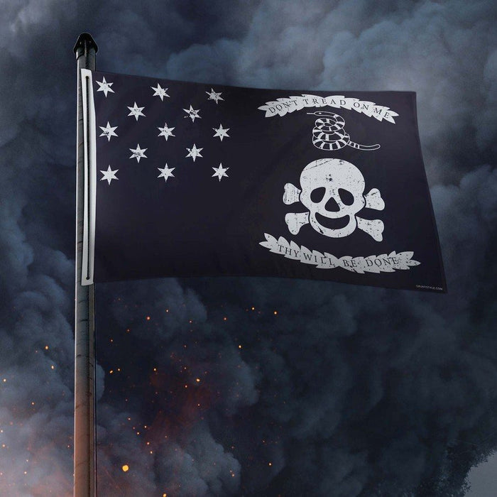 Pirate flag with skull and crossbones design against a dark, smoky background