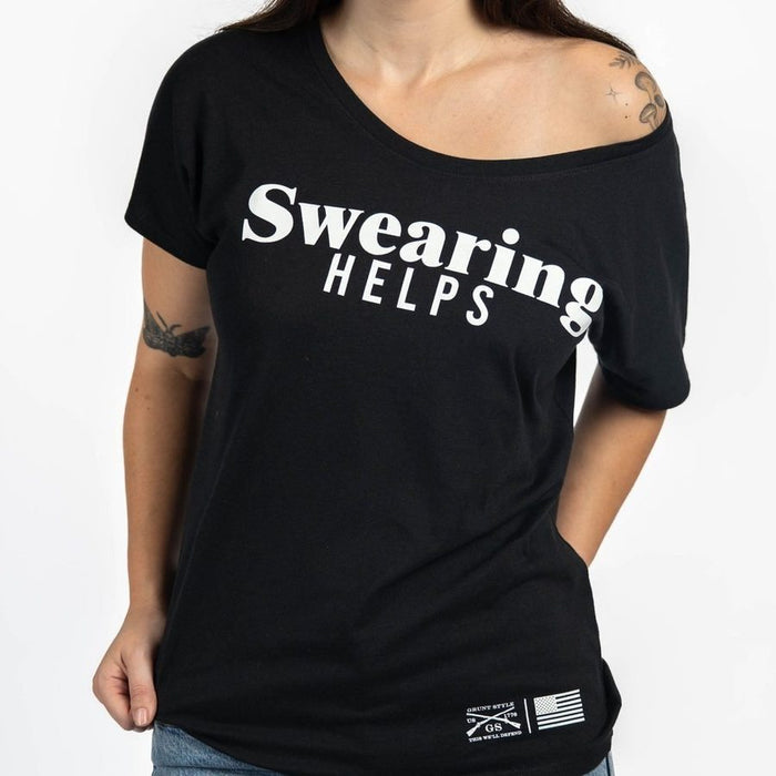Black t-shirt with 'Swearing HELPS' text worn by a person on a white background